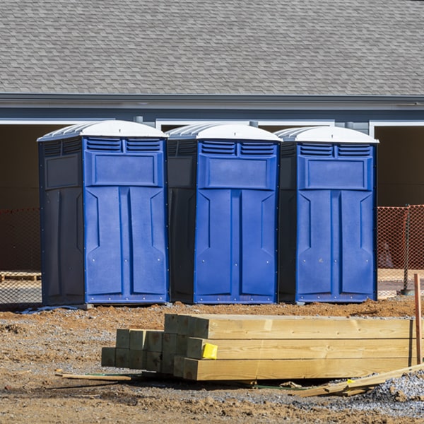 what is the cost difference between standard and deluxe portable restroom rentals in Mount Liberty